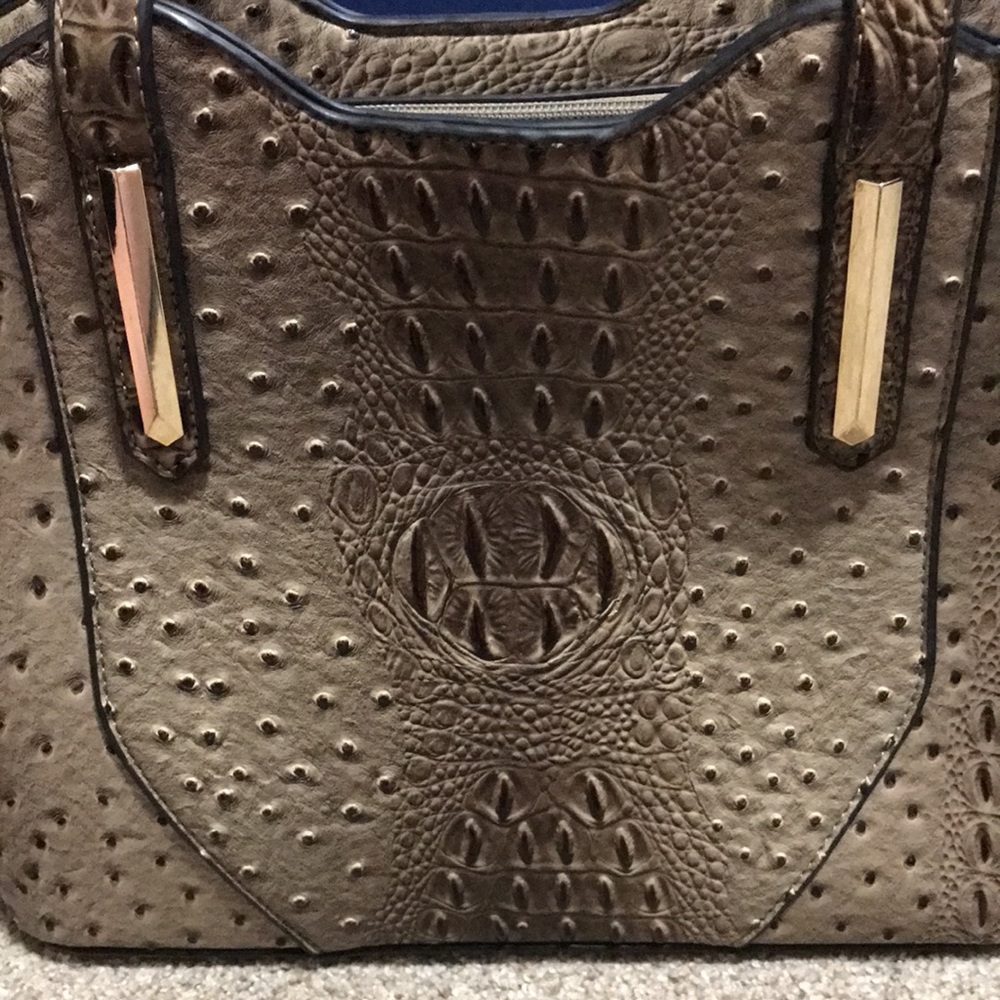 Like leather tan and dark brown fancy purse!